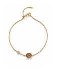 Gold filled bracelet with organic rosecut tourmaline on a station chain, Version A, on a white background by Camille Jewelry