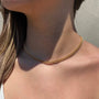 Woman wearing a gold filled curb chain link necklace in 14K gold filled by Camille Jewelry
