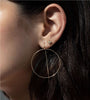Gold filled threader hoop earrings on a model close up image by Camille Jewelry