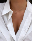 14K Yellow Gold Opal & Diamond Charm Necklace Worn on model- Camille Jewelry