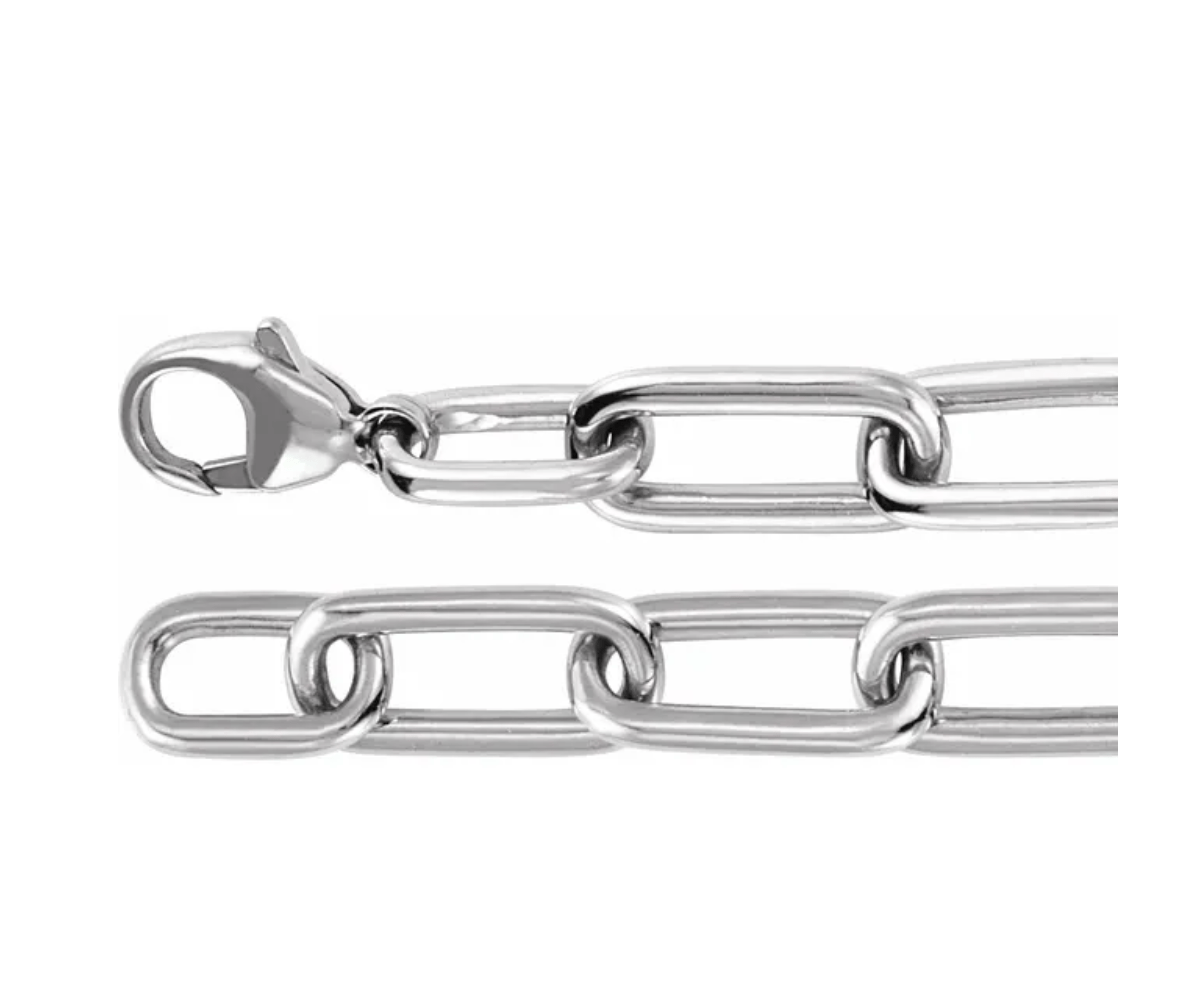 white gold paperclip closure on a white background by Camille Jewelry. 