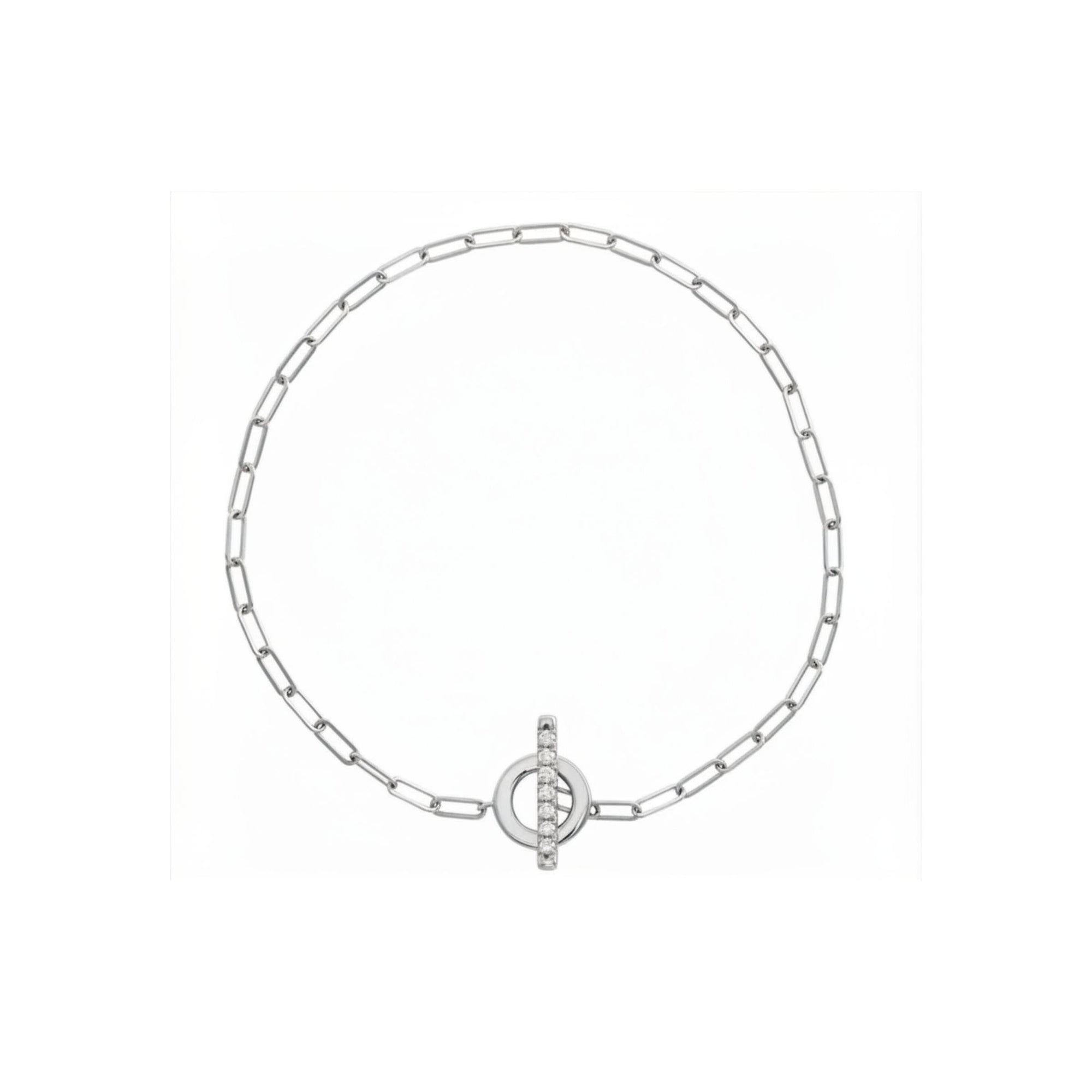 Gold toggle bracelet in 14K white gold with diamond set bar on a white background by Camille Jewelry