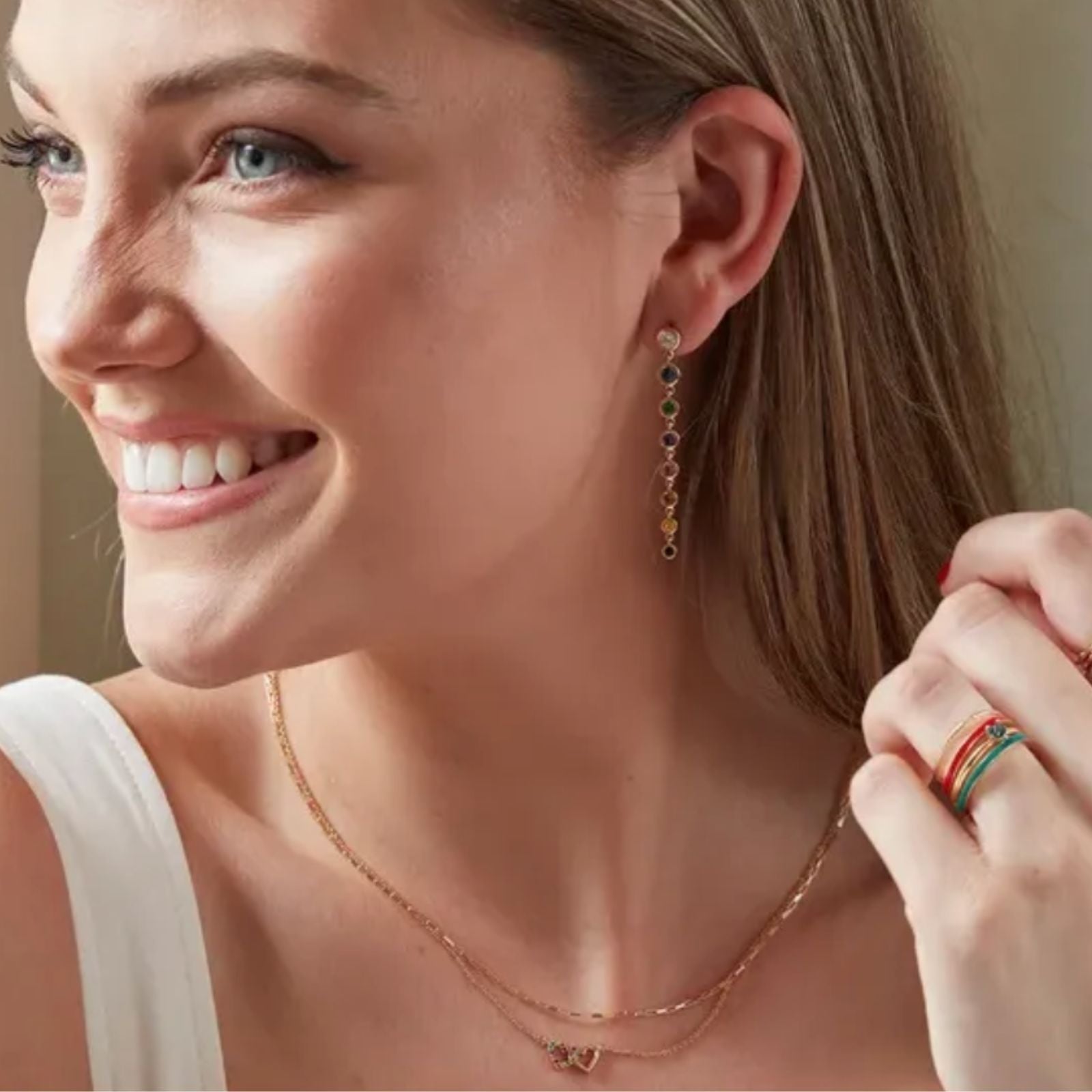 Graduated Rainbow Gemstone Dangle Earrings in 14K gold on model - Camille Jewelry