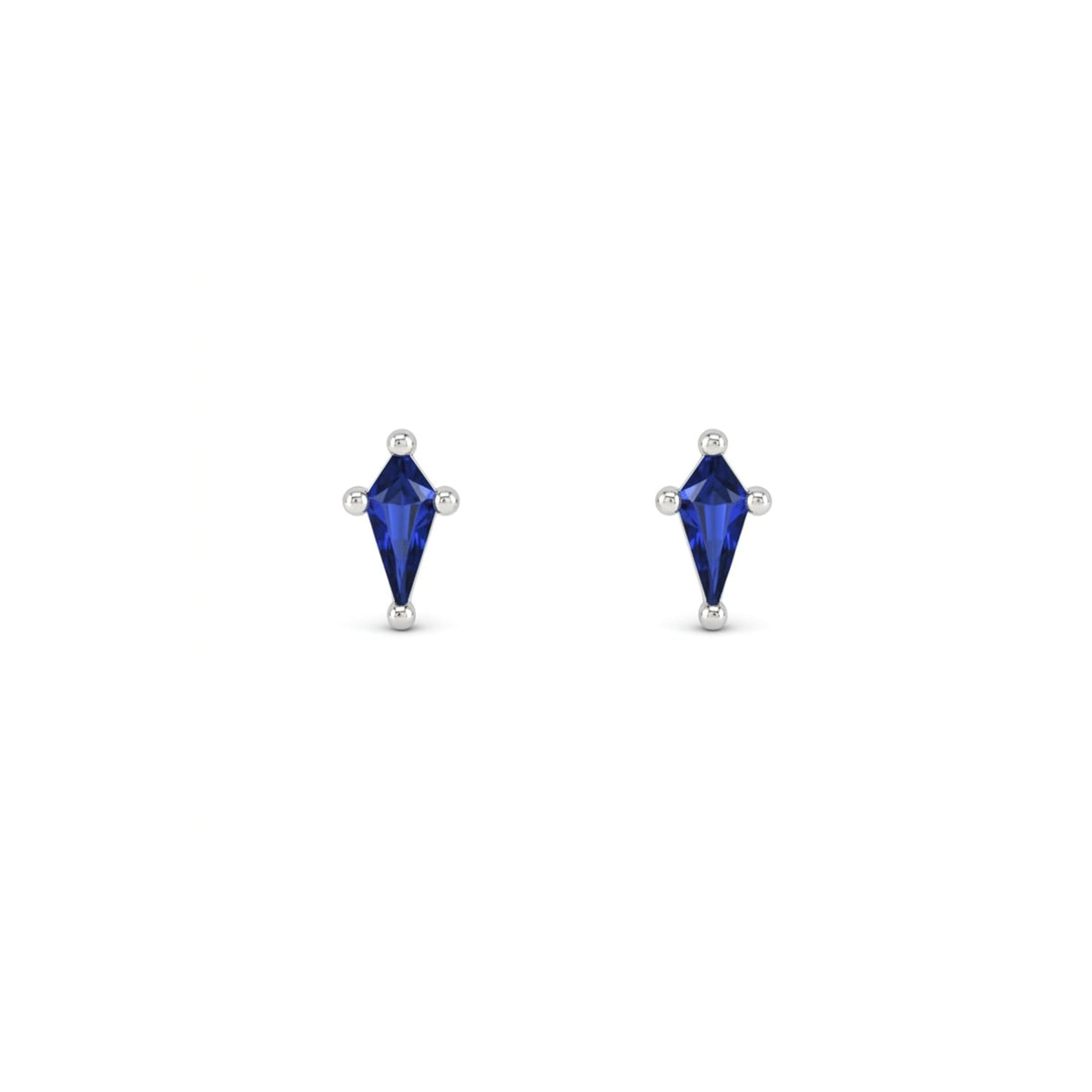 Kite cut lab created sapphire stud earrings in 14K white gold on a white background by Camille Jewelry