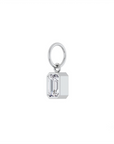 Lab grown diamond charm in 14K yellow gold with a bezel set stone on a white background angled view by Camille Jewelry