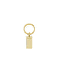 Lab grown diamond charm in 14K yellow gold with a bezel set stone on a white background side view by Camille Jewelry