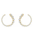 Small diamond hoop earrings in 14K yellow gold on a white background - Camille Jewelry