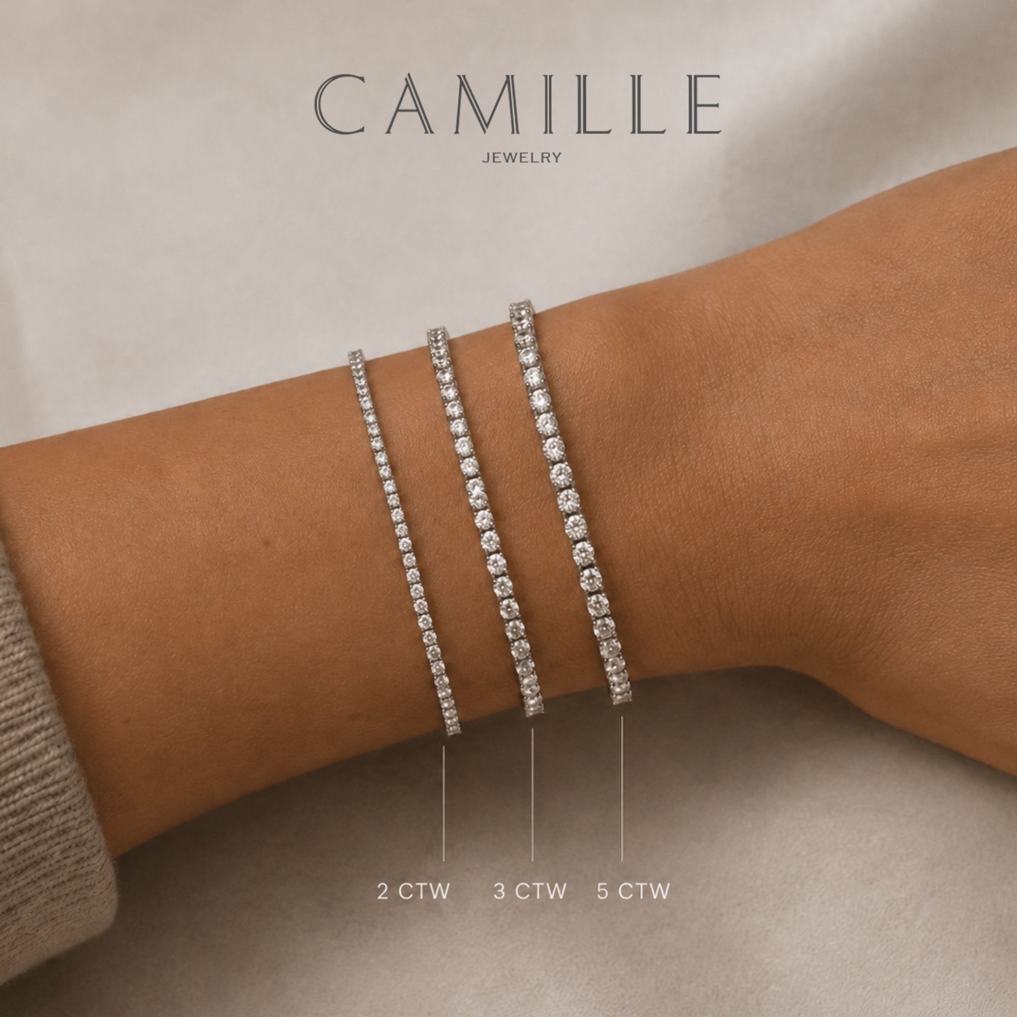Three lab grown diamond tennis bracelets in 14K white gold worn on a wrist, showing 2 CTW, 3 CTW, and 5 CTW size comparison by Camille Jewelry
