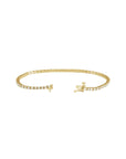 Open clasp detail of a lab grown diamond tennis bracelet in 14K yellow gold on a white background by Camille Jewelry