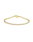 Lab grown diamond tennis bracelet in 14K yellow gold on a white background by Camille Jewelry
