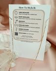 Magnetic Necklace Convertible Bar Chain on back of paper stand with Guide on How to Wtyle it by Camille Jewelry