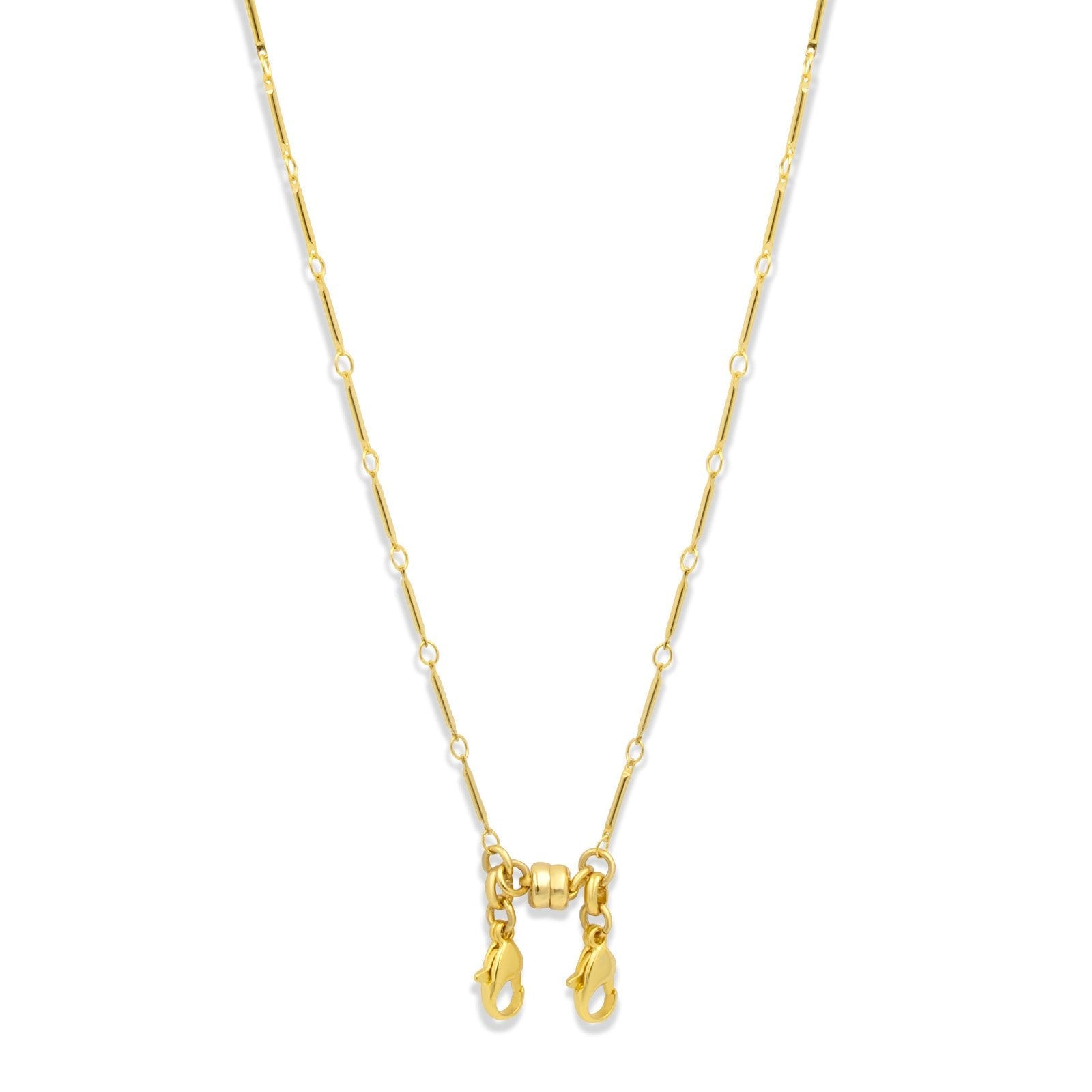 Magnetic convertible bar chain necklace in gold plated brass on a white background by Camille Jewelry