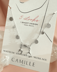 Silver plated disc charm convertible necklace and eyeglass chain on a card by Camille Jewelry.