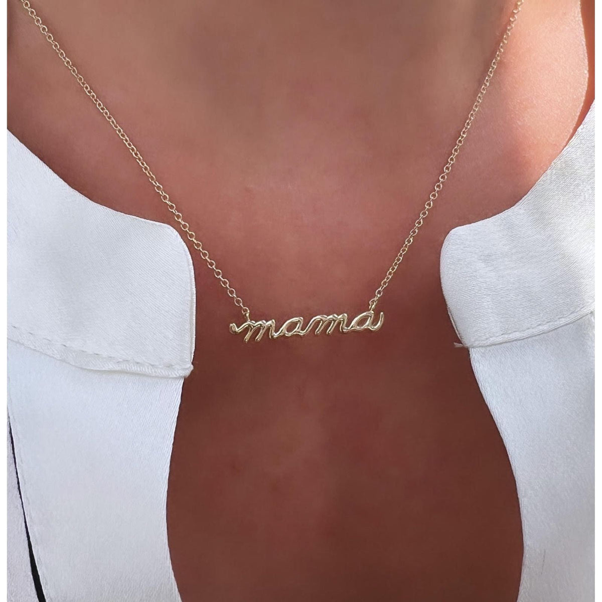 14k yellow Gold script Mama Necklace on model |  Camille Jewelry