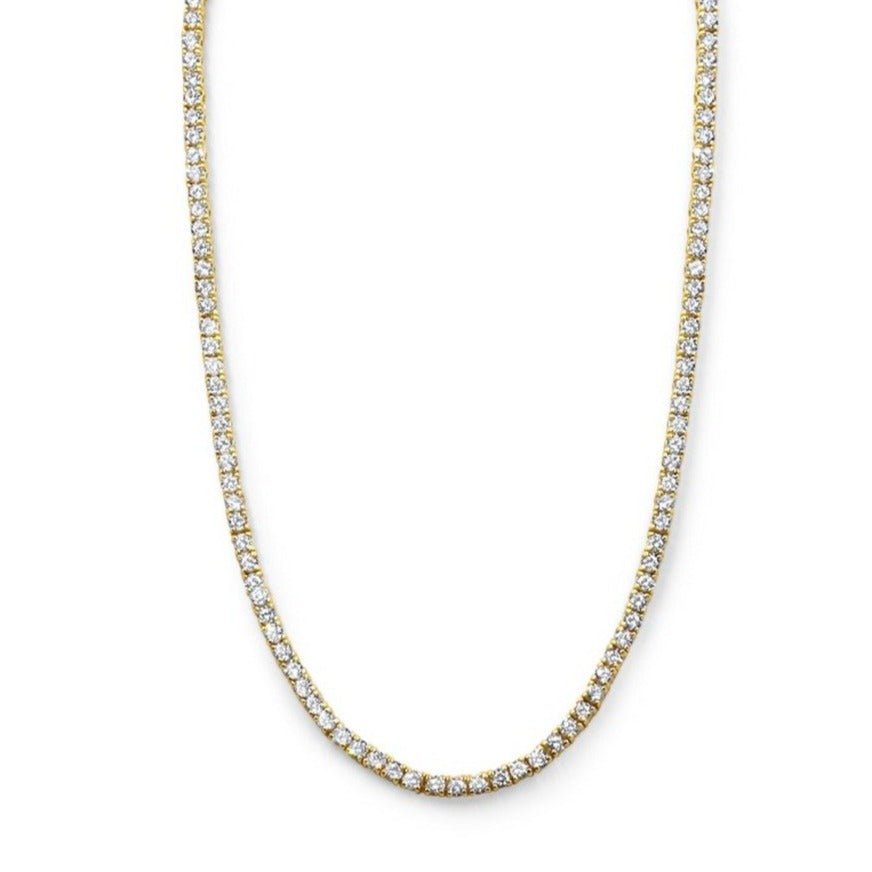 Modern tennis necklace in gold plated sterling silver with cubic zirconia on a white background by Camille Jewelry