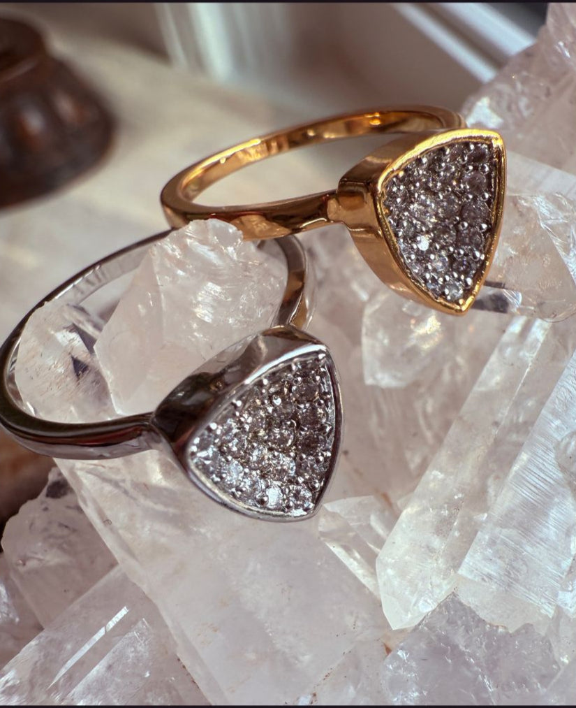 Gold & Silver Trillion Stackable Rings on a quartz display– Concave Pavé Everyday Bands - Camille Jewelry