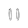 Pavé hinged hoop earrings in 14K gold plated sterling silver with cubic zirconia on a white background by Camille Jewelry