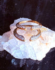 Phoenix Ring in Gold-Plated Statement Jewelry on a white Quartz display- Camille Jewelry