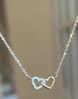 Diamond mini interlocking heart necklace dangle on video | Camille Jewelry