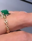Model wearing a mix of gold , diamond and gemstone rings | Camille Jewelry