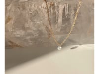 Drilled diamond gold necklace on quart stone video | Camille Jewelry