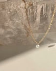 Drilled diamond gold necklace on quart stone video | Camille Jewelry