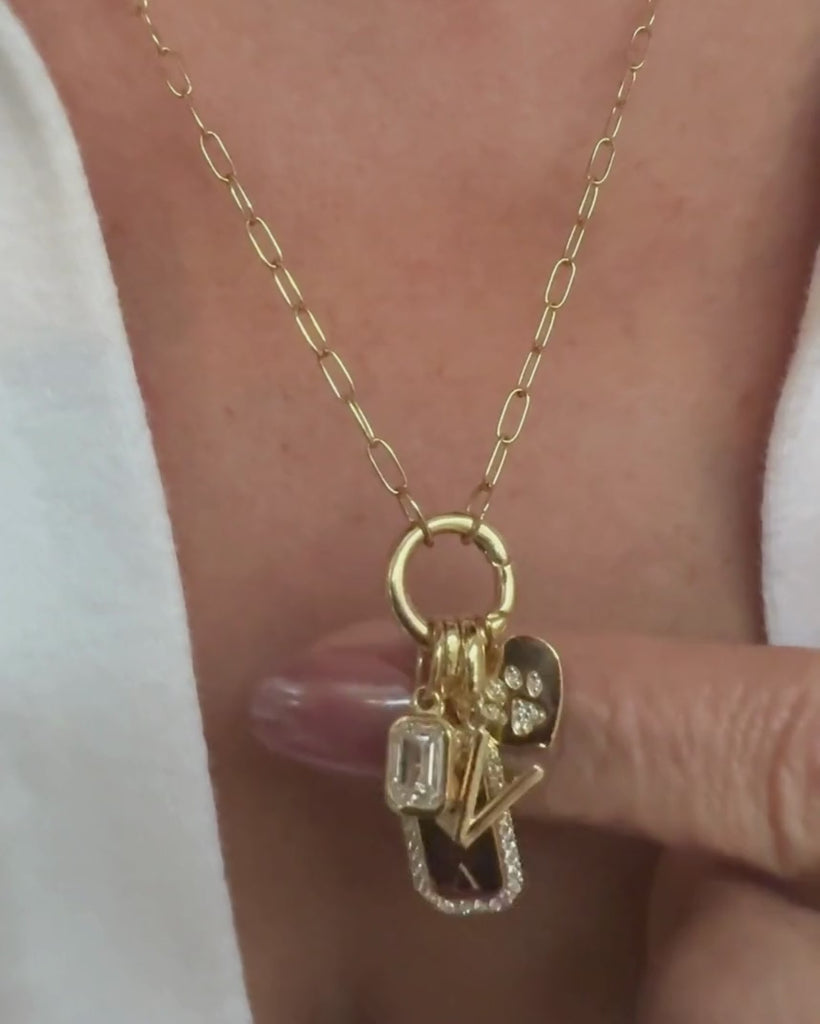 gold charm necklace and holder in diamonds and personalization by Camille Jewelry.