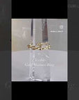 Flexible gold mariner chain ring rotating on a quartz stone | Camille Jewelry
