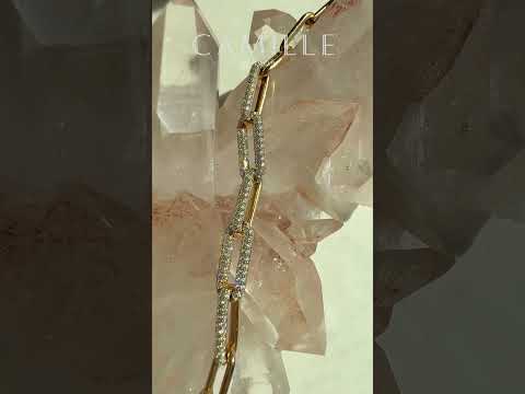 Video of Gold Paperclip Bracelet in 14K yellow gold with 1.5 CTW lab-grown diamonds, pavé chain design by Camille Jewelry, showing sparkle and movement.