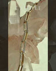 Video of Gold Paperclip Bracelet in 14K yellow gold with 1.5 CTW lab-grown diamonds, pavé chain design by Camille Jewelry, showing sparkle and movement.