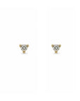 Tiny diamond stud earring in yellow gold worn on model’s ear, Camille Jewelry