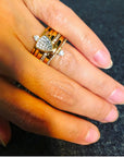 Woman wearing a skinny trillion pavé stacking ring in sterling silver on her hand by Camille Jewelry