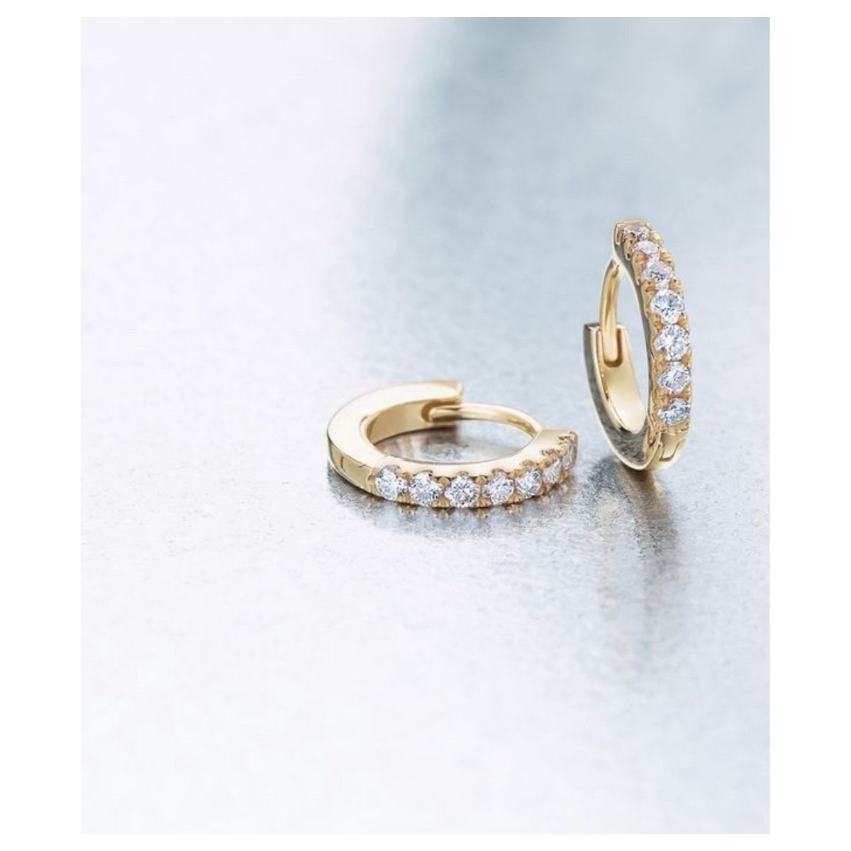 14K yellow gold Small Diamond Hoops On Display- Camille Jewelry