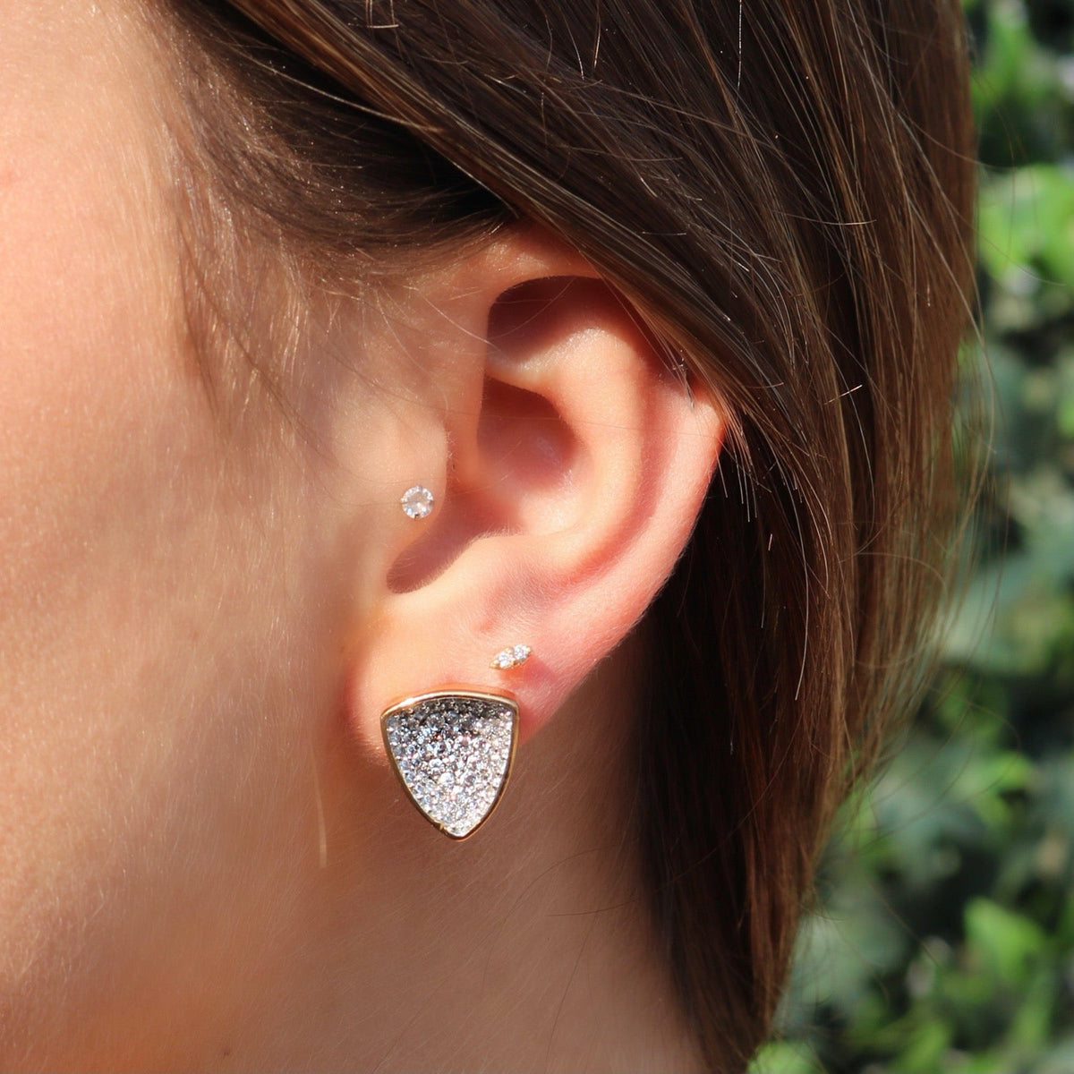 Gold Trillion Stud Earrings on models ear– Concave Pavé Sparkle - Camille Jewelry