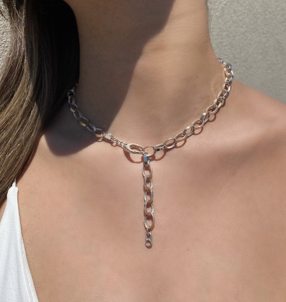 Sterling Silver Braided Texture Oval Link Necklace worn as a Y neck style on model - Camille Jewelry