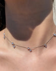 Model wearing Sterling Silver Charm Necklace on a models neck- Camille Jewelry