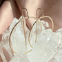 Close up of threader hoop earrings in 14K gold filled showing the 1mm box chain detail and 40mm hoop by Camille Jewelry