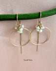 Close up of the hand wrapped faceted rondelle gemstone cluster on gold filled threader hoop earrings  small size by Camille Jewelry