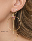 Gold filled gemstone threader hoop earrings worn on a model showing the pull through drop and movement by Camille Jewelry
