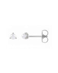 Tiny pearl stud earrings in 14K white gold on a white background by Camille Jewelry