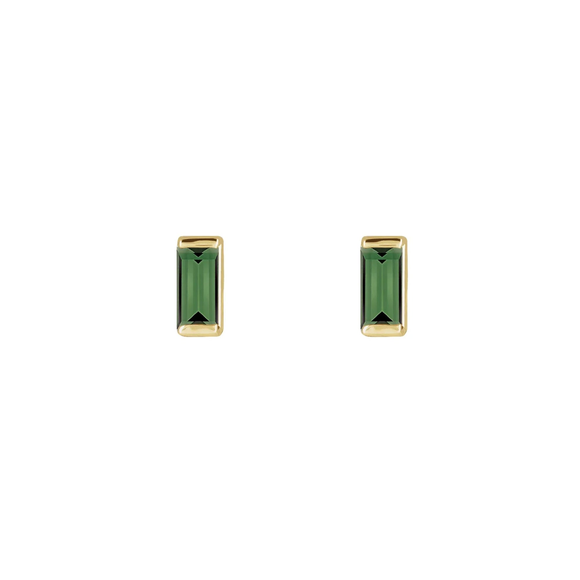Pair of green tourmaline tiny stud earrings in 14k yellow gold on a white background by Camille Jewelry