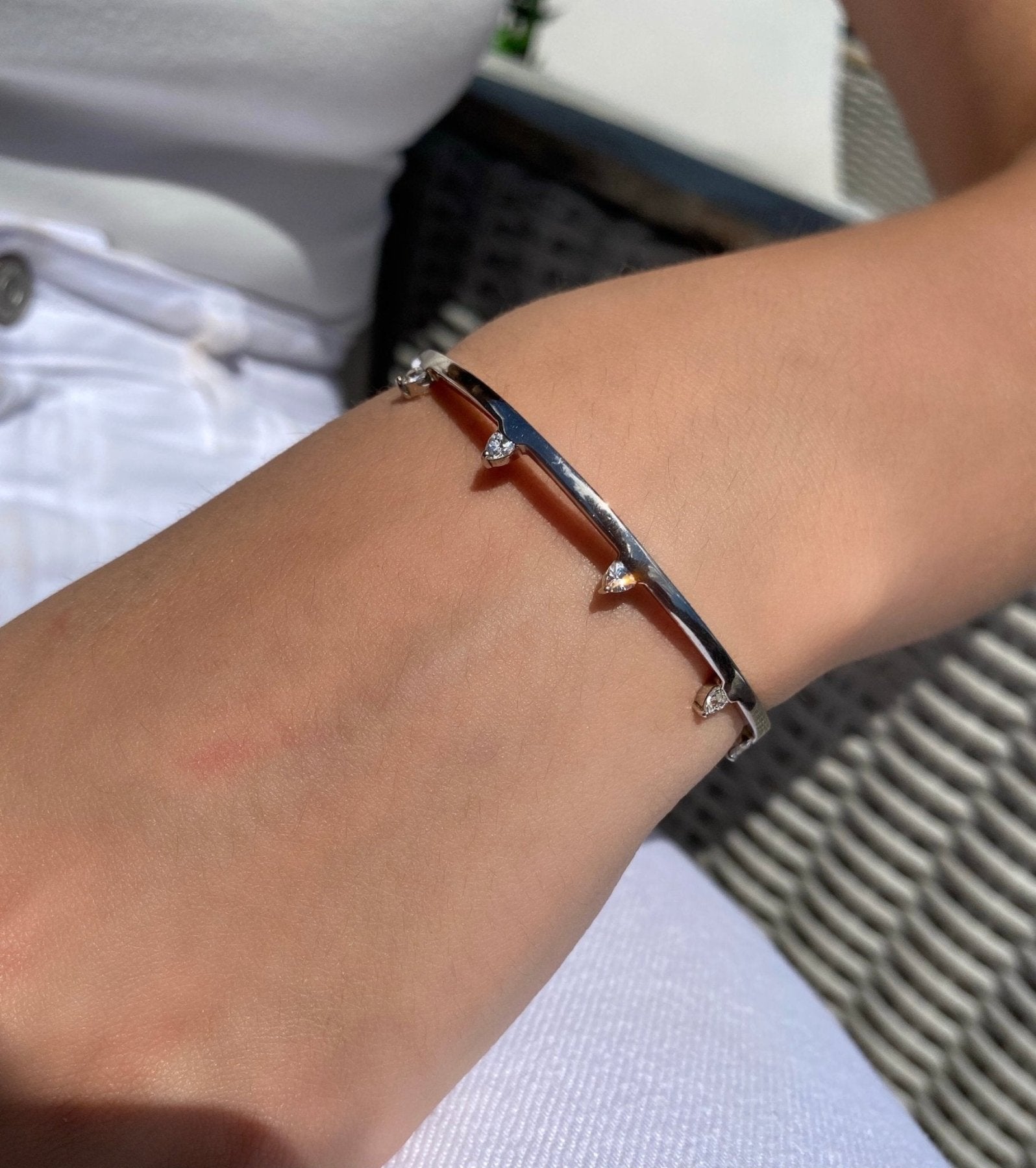 Trillion Cuff Bracelet – Edgy Bangle in Gold Vermeil on models wrist- Camille Jewelry