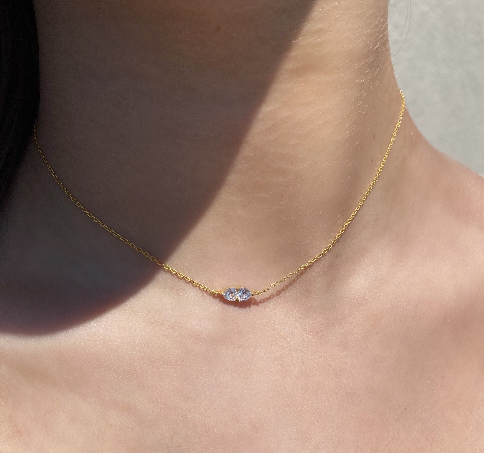 Double Trillion Solitaire Necklace | Gold Vermeil Semi-Fine Jewelry on models neck- Camille Jewelry