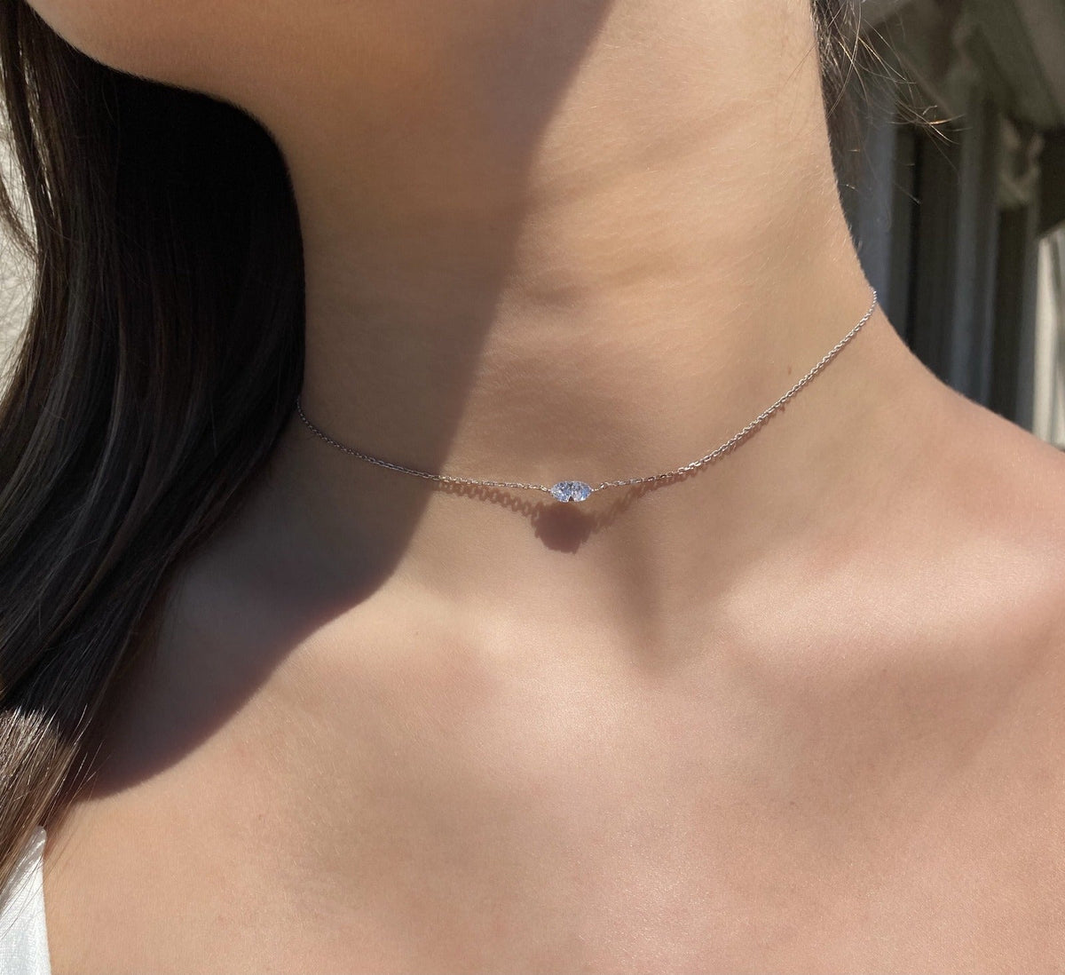 Double Trillion Solitaire Necklace | Silver Semi-Fine Jewelry on models neck - Camille Jewelry